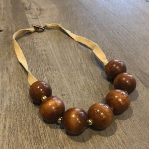 Wooden Bead Necklace on Suede Fabric